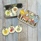 Stitch Markers In A Tin