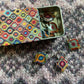 Stitch Markers In A Tin