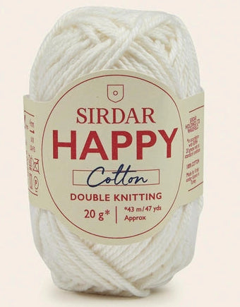 Ball of Sirdar Happy Cotton yarn on a beige background