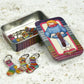 Stitch Markers In A Tin