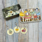 Stitch Markers In A Tin